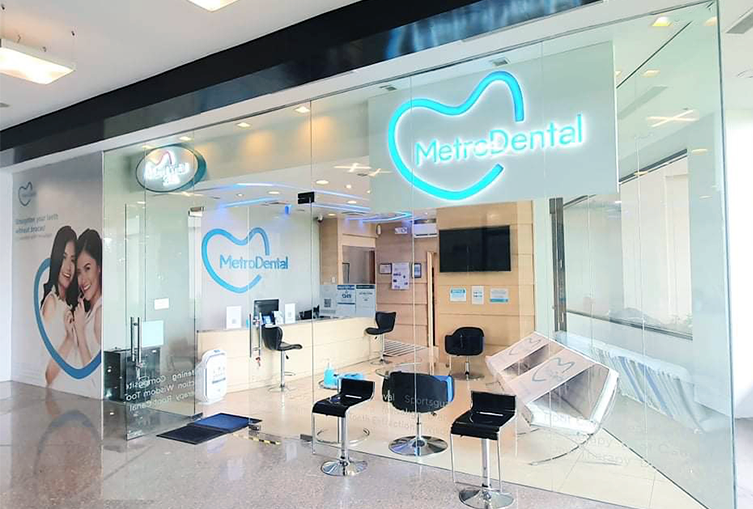 Dental office showcasing a prominent "Metro Dental" logo.